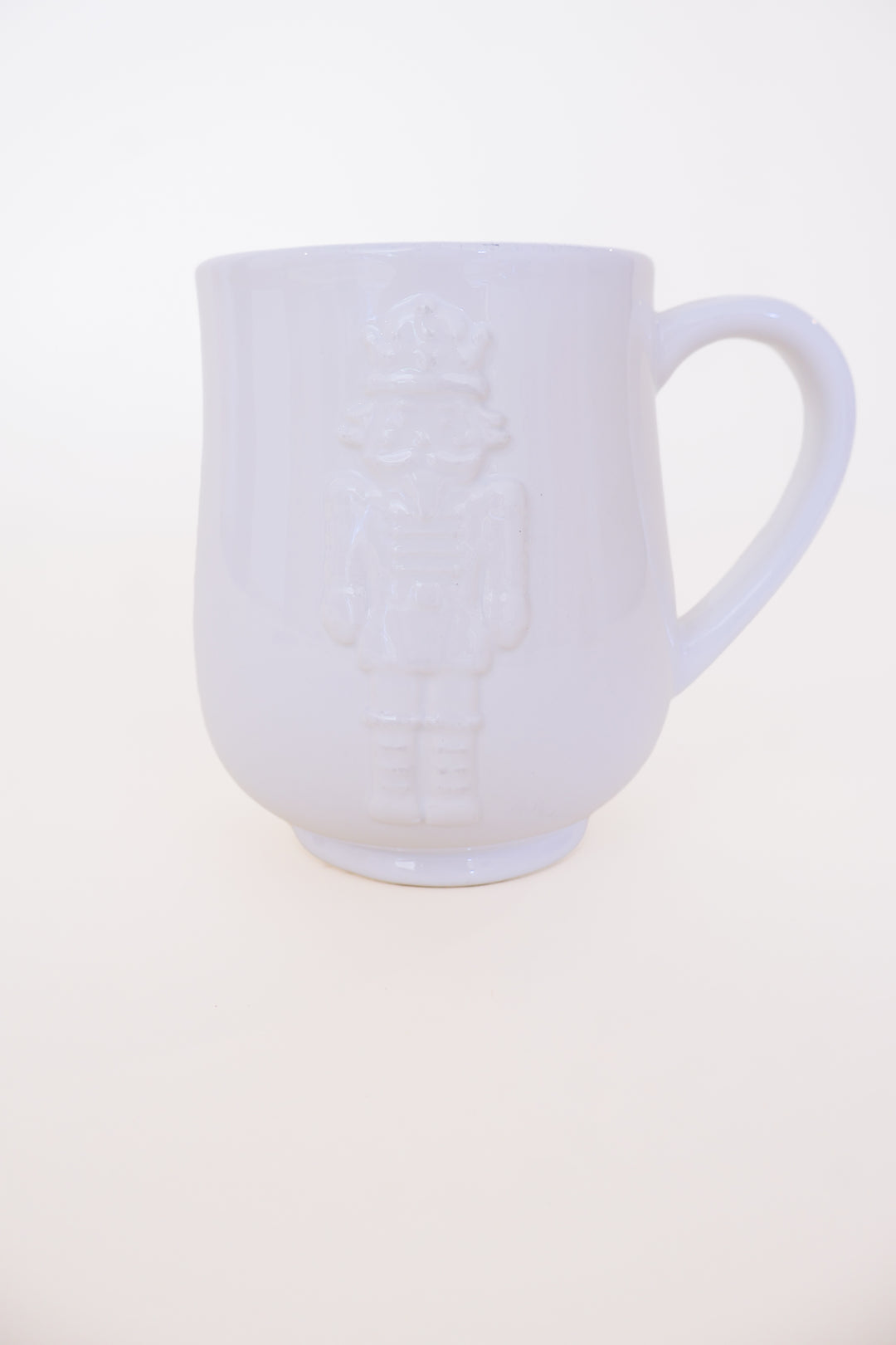Royal Nutcracker Embossed Coffee Mug – White | 18 oz